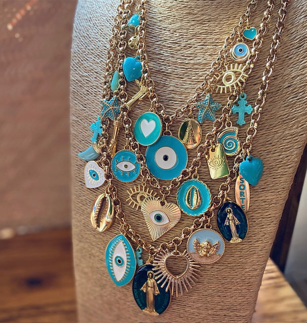 Multi strands necklace with turquoise and gold charms